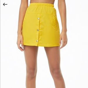 Nylon button front mini skirt